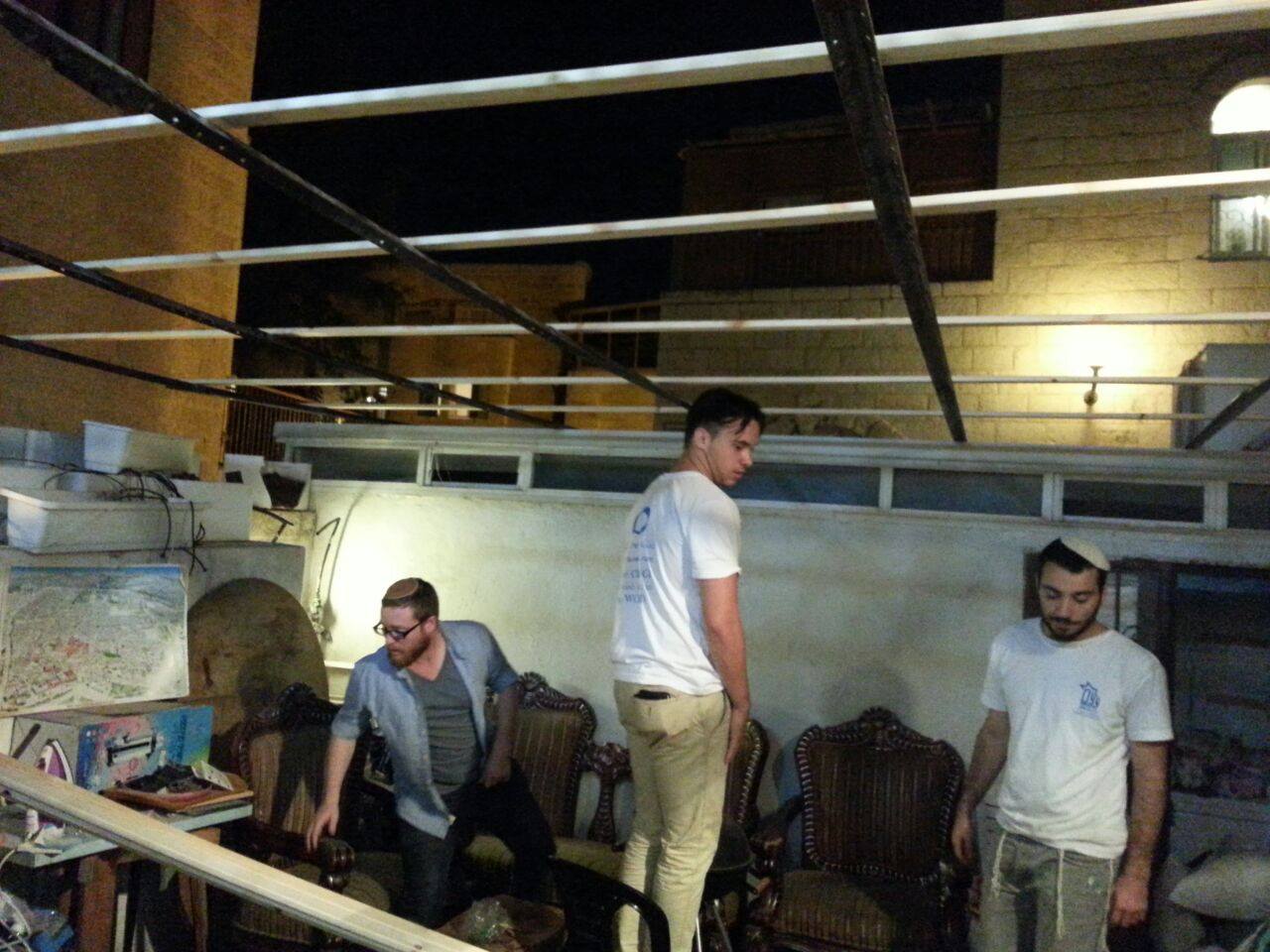 Sukkah going up at the Jerusalem Heritage House!