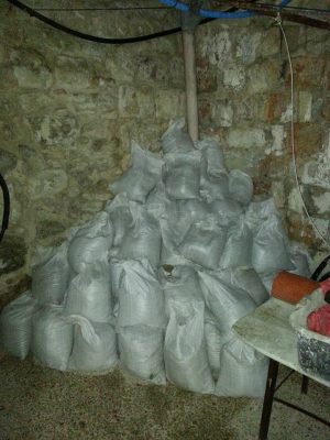 The floor is level and the bags are full of debris.