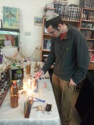 Our "lone soldiers" and guests celebrating Hanukkah