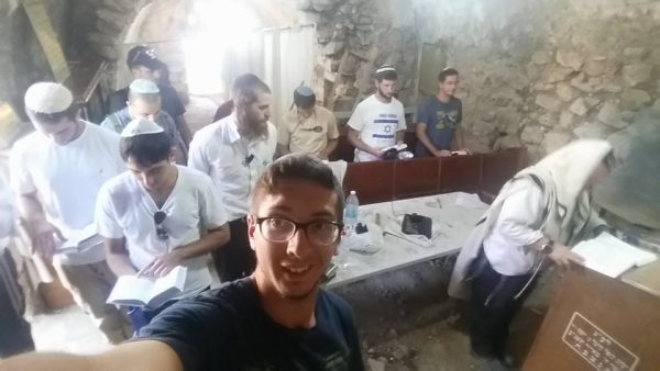 Praying the mincha afternoon service in the ancient synagogue