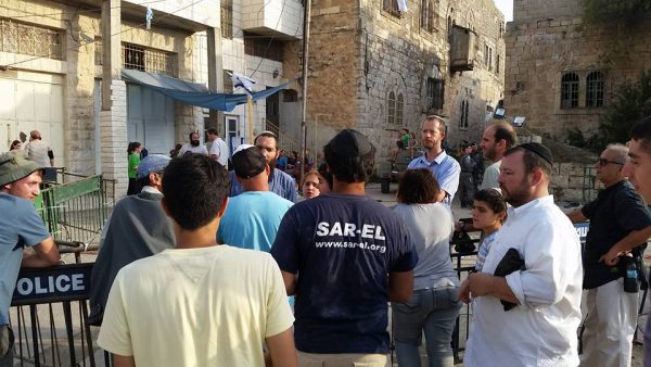 At Beit Machpelah in Hevron - showing support and giving treats to the kids inside.