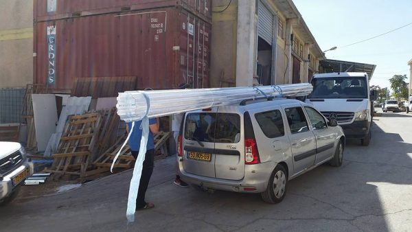 Buying and transporting the day's building materials!