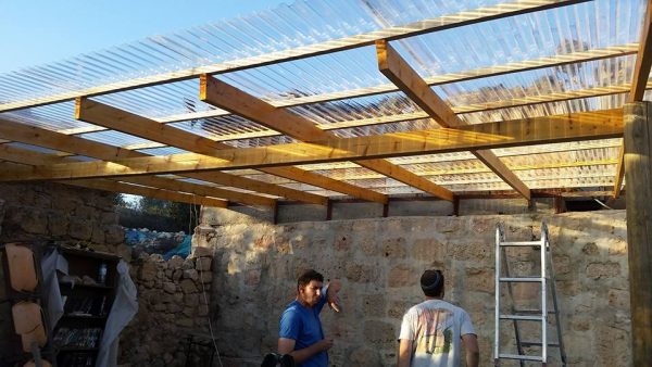 The platic cover is up and securely installed. All ready for Shabbos "Chayai Sarah" and for the rest of the year!